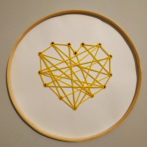 Créez un coeur en corde avec la crop-a-dile II de WRMK en utilisant le tachnique du string art